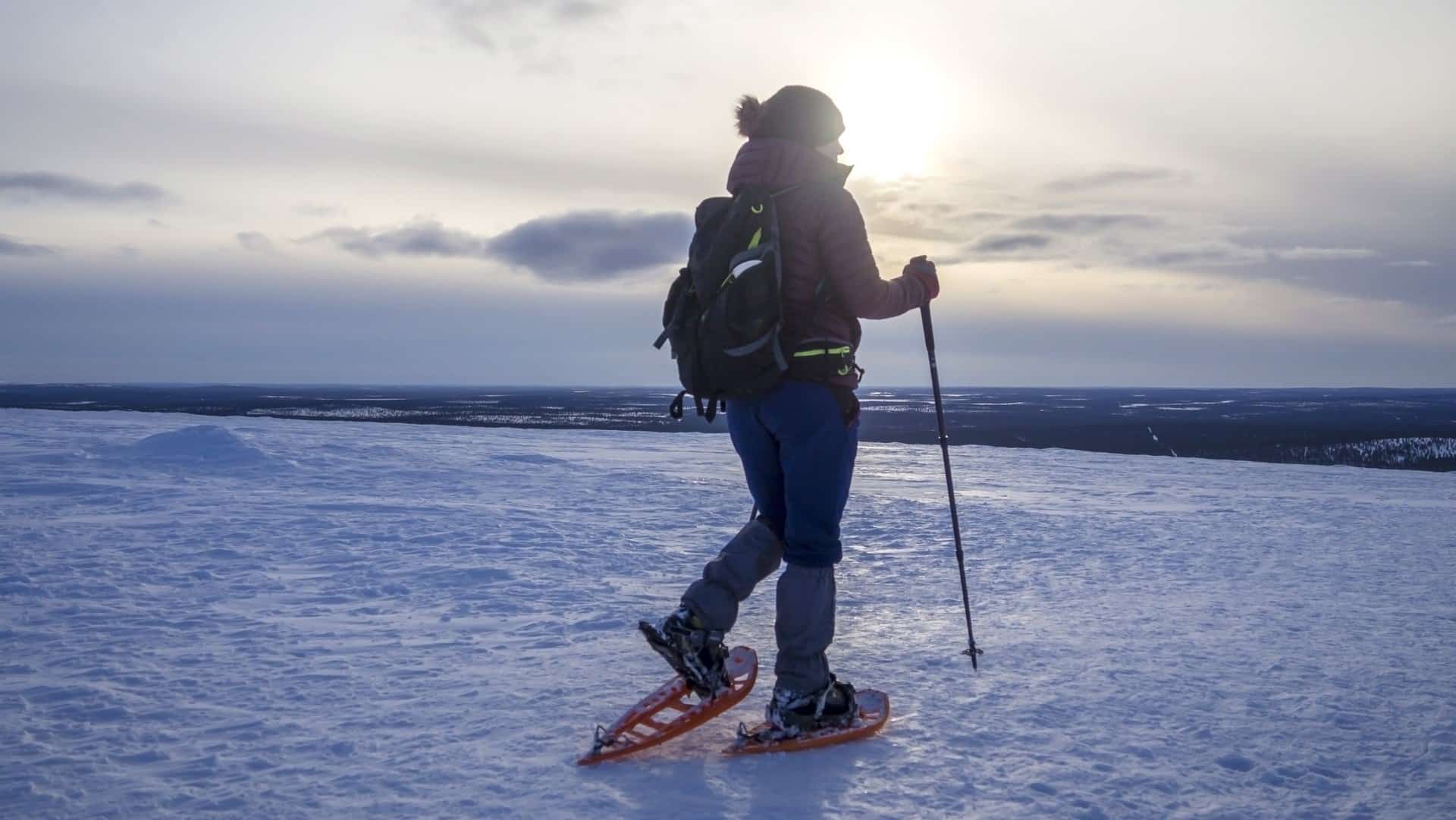 A woman Snowshoeing