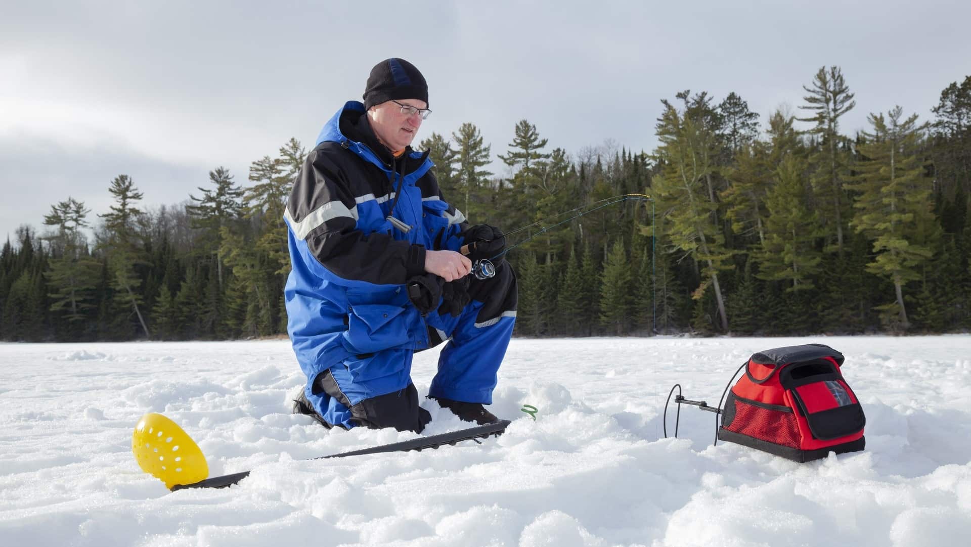 Man ice fishing