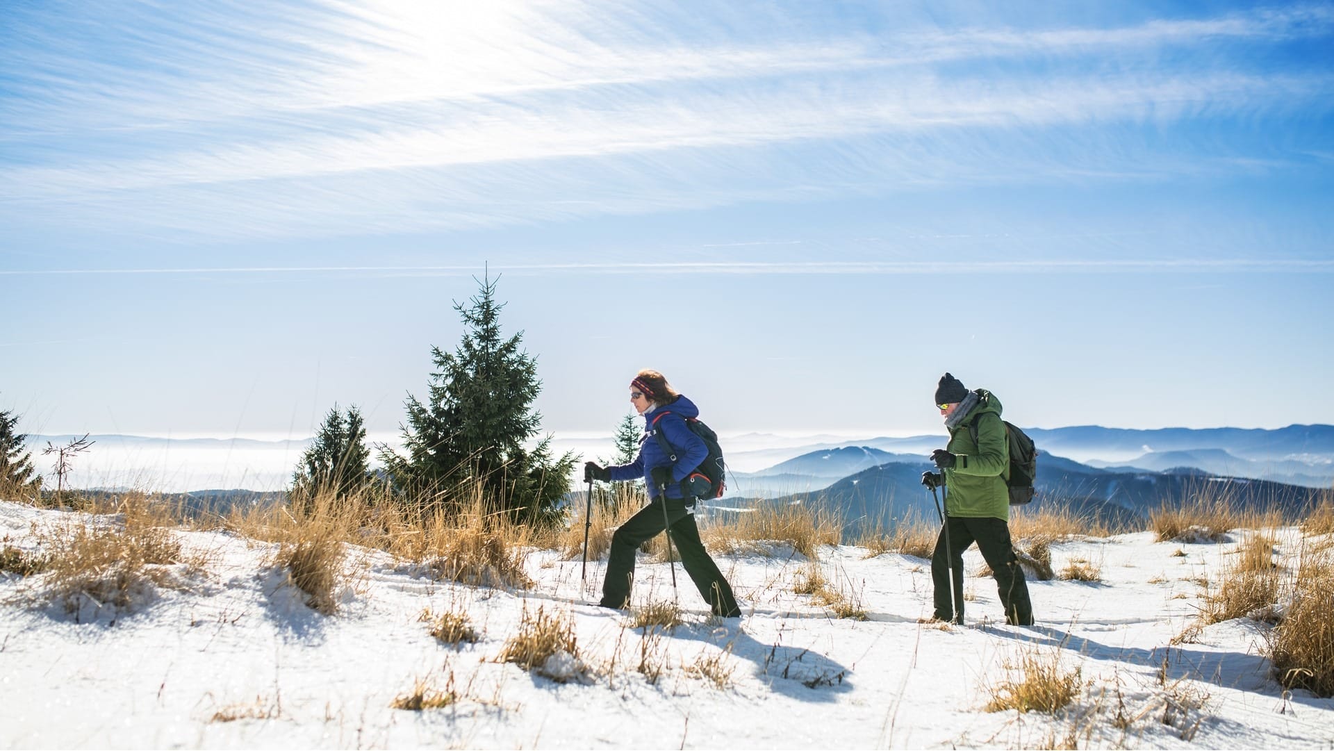 senior couple winter hiking